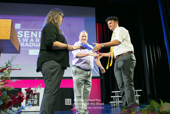 DJ D'Angelo receives the Florida Association of the Deaf Scholarship at the 2018 FSDB Senior Awards.