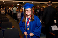 Milliken Bartlett (Blind) walks down the aisle during the 104th Commencement for the Graduating Classes of 2018