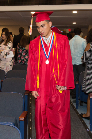 Kenneth Corrales (Deaf) walks down the aisle during the 104th Commencement for the Graduating Classes of 2018