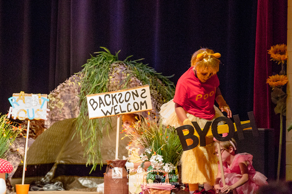 Pooh puts up a sign that reads "BYOH, Bring Your Own Honey."