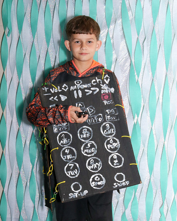 Boy dressed as a remote control