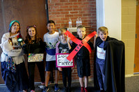 Deaf 5th graders dressed in different costumes.