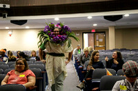 Teacher dressed as a bouquet of flowers.