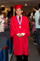 Javier DiGonzalez (Deaf) smiling as he walks down the aisle during the 104th Commencement for the Graduating Classes of 2018