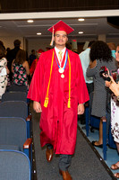 DJ D'Angelo walks dow the aisle during the 104th Commencement for the Graduating Classes of 2018