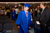 Rey Cubas (Blind) walks down the aisle during the 104th Commencement for the Graduating Classes of 2018