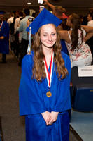 Taylor Muske (Blind) smiles as she walks down the aisle during the 104th Commencement for the Graduating Classes of 2018